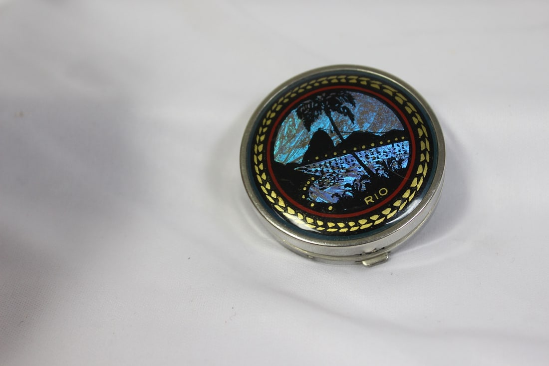 A Rion Compact: 2" in diameter