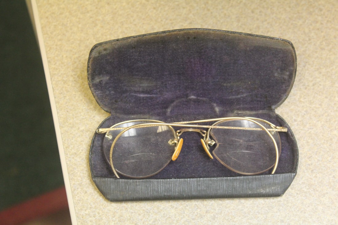 Gold filled glass pair with case: please note: cracked and arm needs adjustment