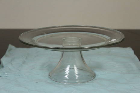 A Glass Cake Plate: please note: a scratch, possibly from manufacturer's defect - 10 1/2" in diameter