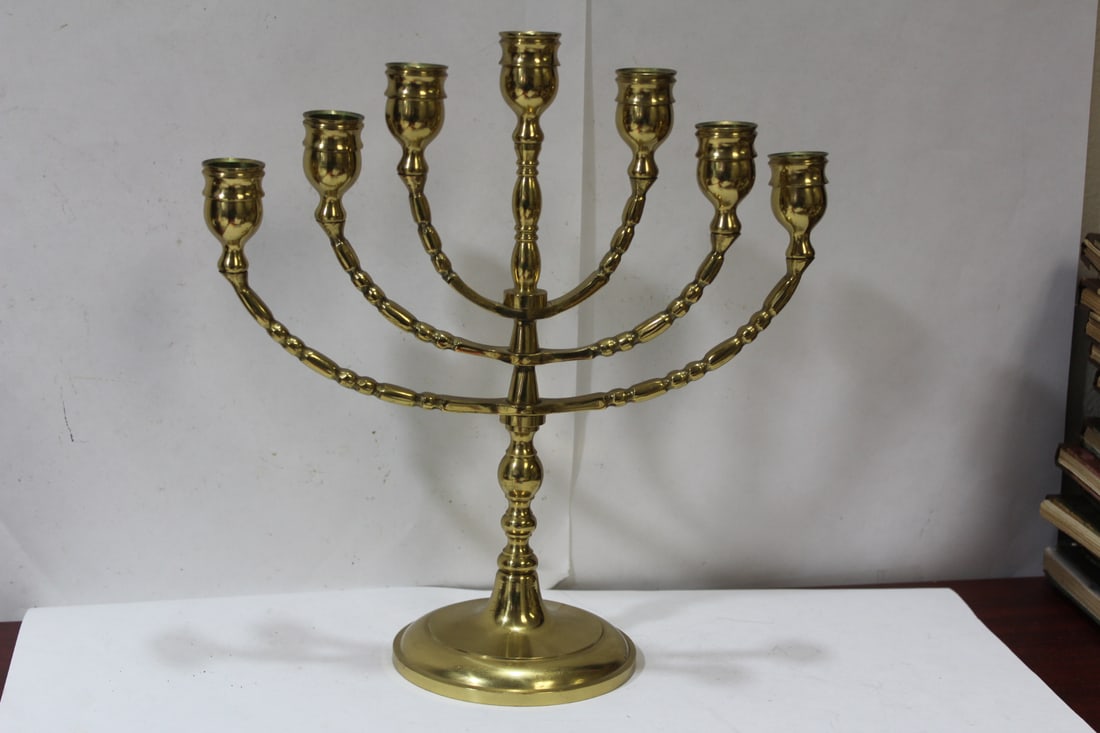 A Brass Menorah: 10 1/2" tall x 10" wide