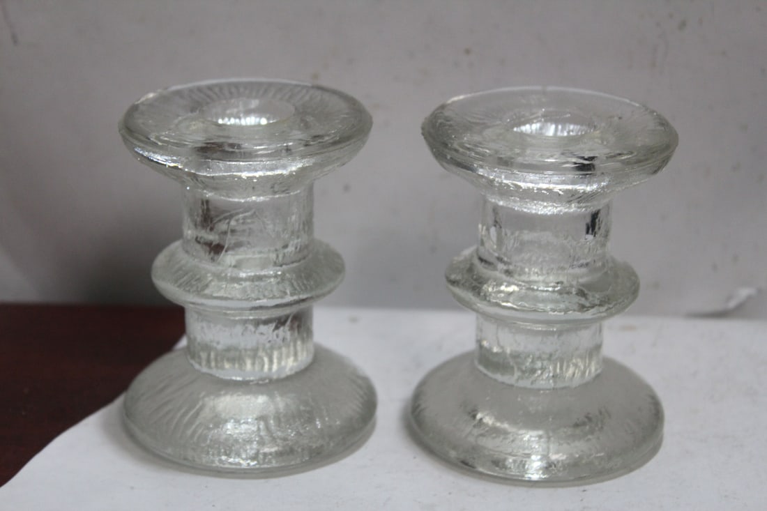 A Pair of Glass Candle Holders: 3 3/8" tall each