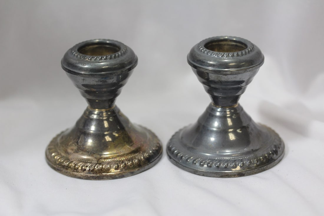 A Pair of Weighted Sterling Candlesticks: 2 1/2" tall