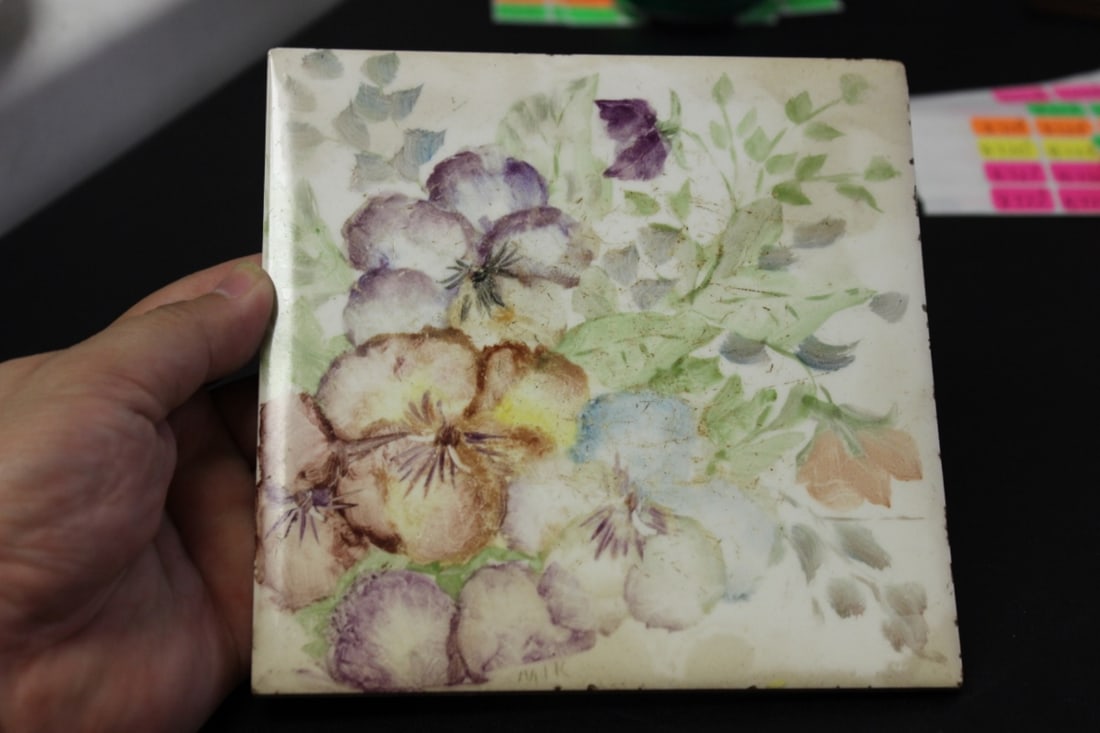 An Outstanding Artist Signed Floral Tile: signed (MIK) - Handpainted - by Wheeling Cushion - 6 1/8" square - some stain