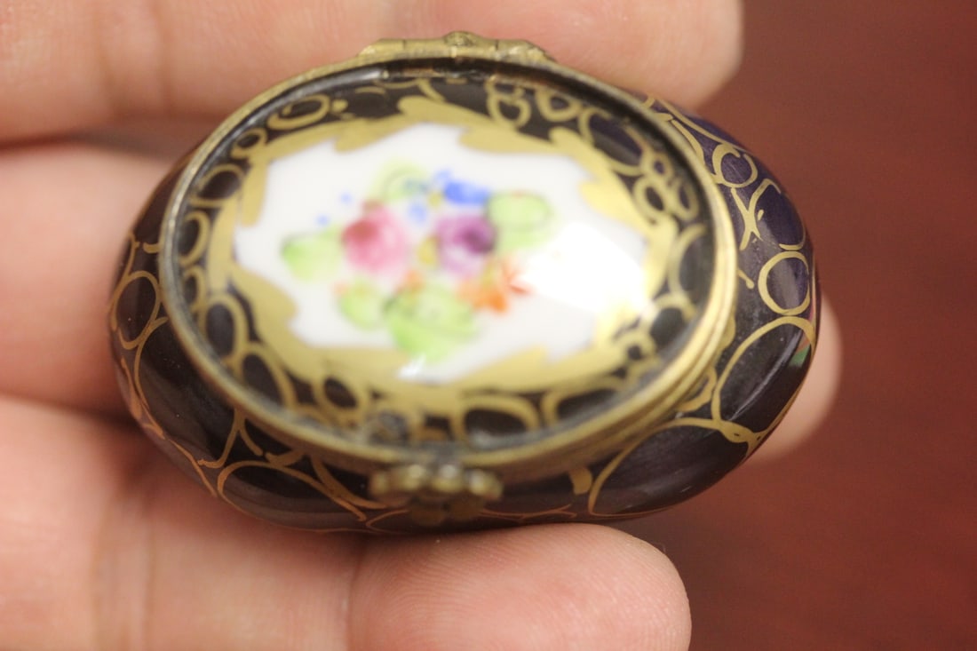 A Limoge Trinket Box: 2" across
