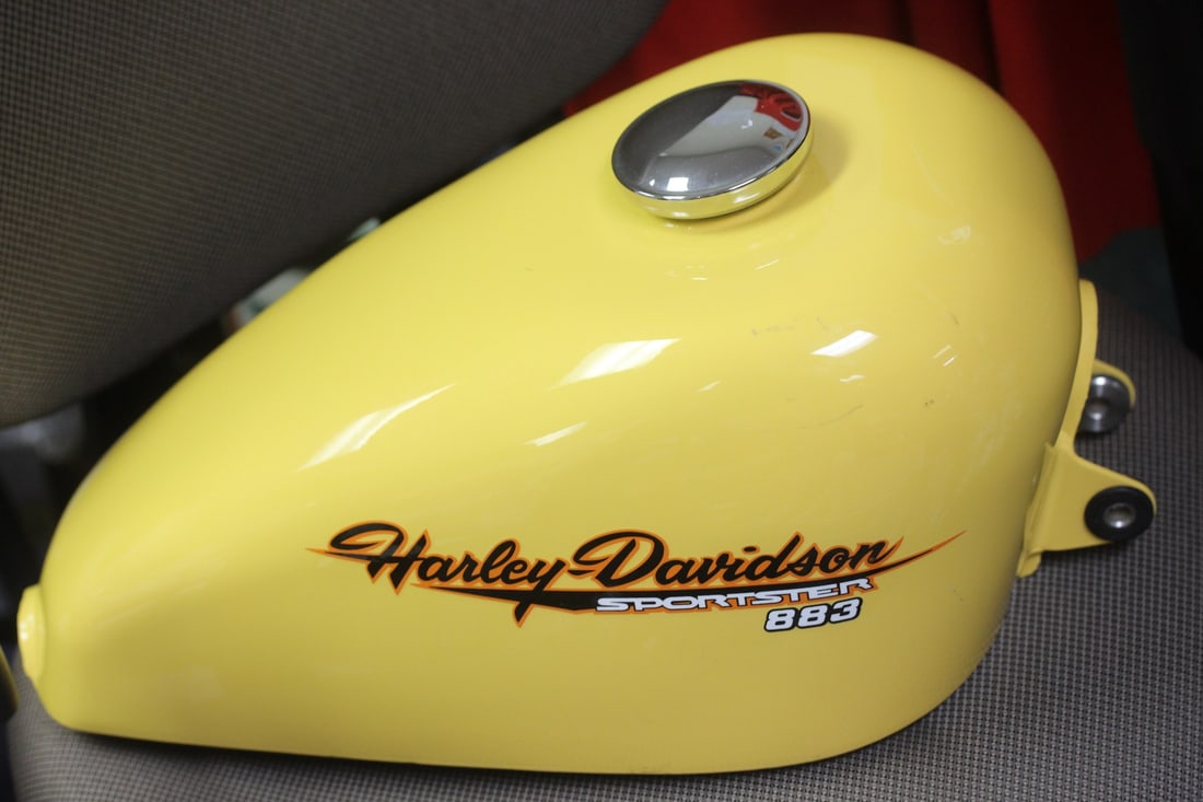 A Harley Davidson Tank: Some small surface scratches which I think can be removed easily