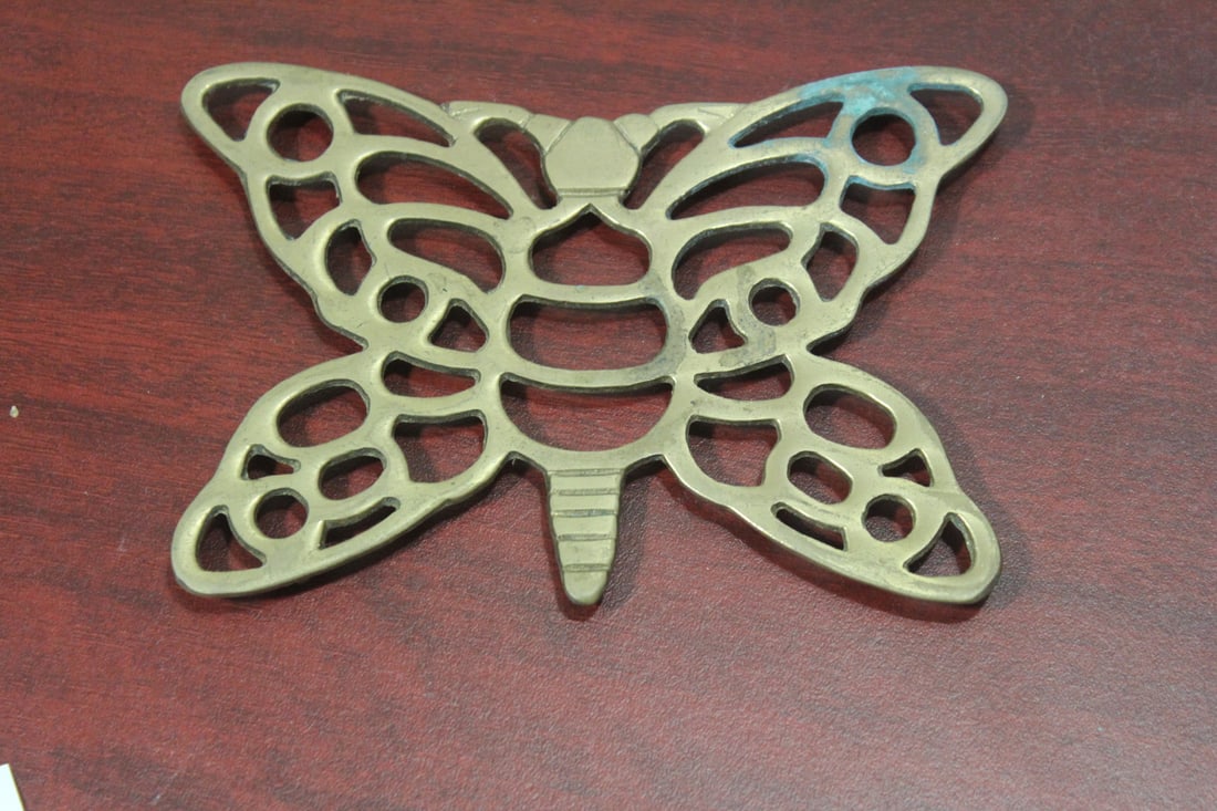 A Brass Trivet: 6 1/4" across