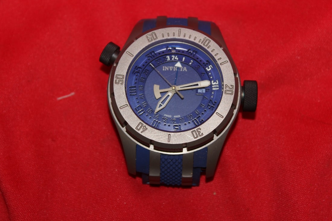 An Invicta Watch: Needs new band - currently working, but cannot guarantee to work when it arrives