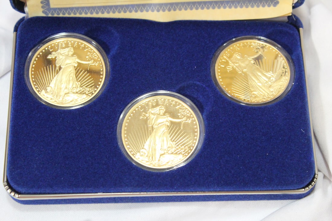 A 24Kt Layered on Pure Silver 3-Coin Set: with one troy ounce each - National Collector's Mint COA