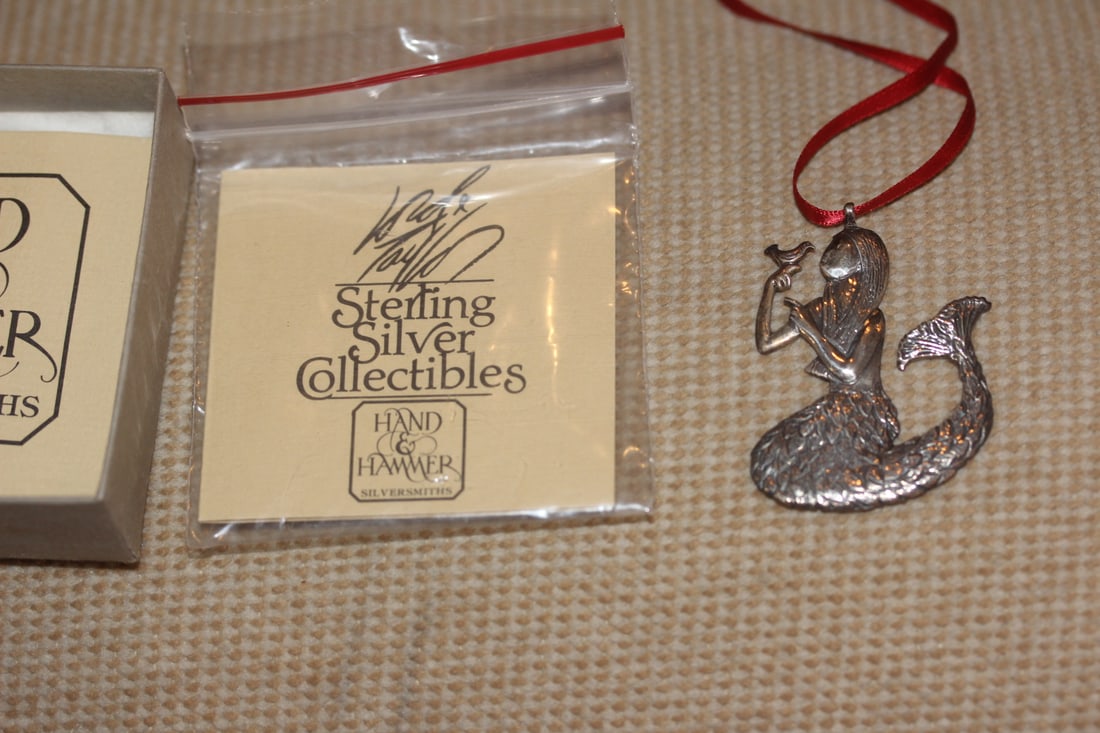 Lord and Taylor Sterling Christmas Ornament: hand hammered - boxed with COA