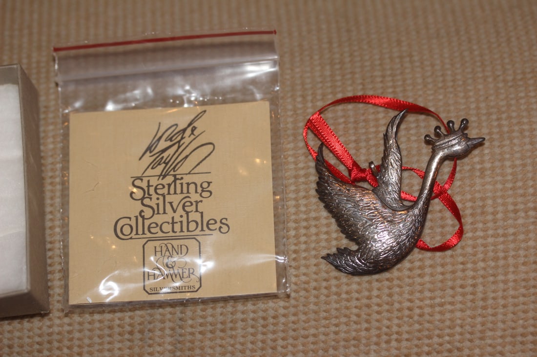 Lord and Taylor Sterling Christmas Ornament: hand hammered - boxed with COA