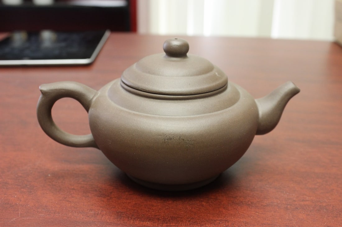 A Yixing Teapot: Signed - 7" wide - Chinese