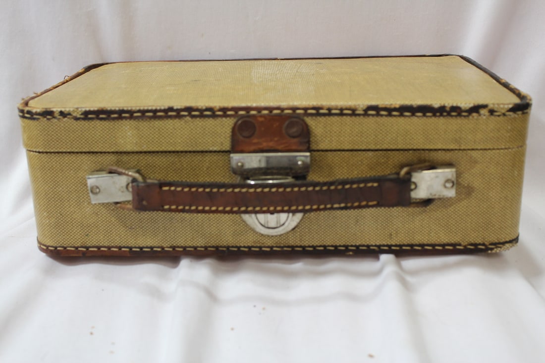 A Leitz Projector: cord needs to be replaced - do not know if it works or not - cased