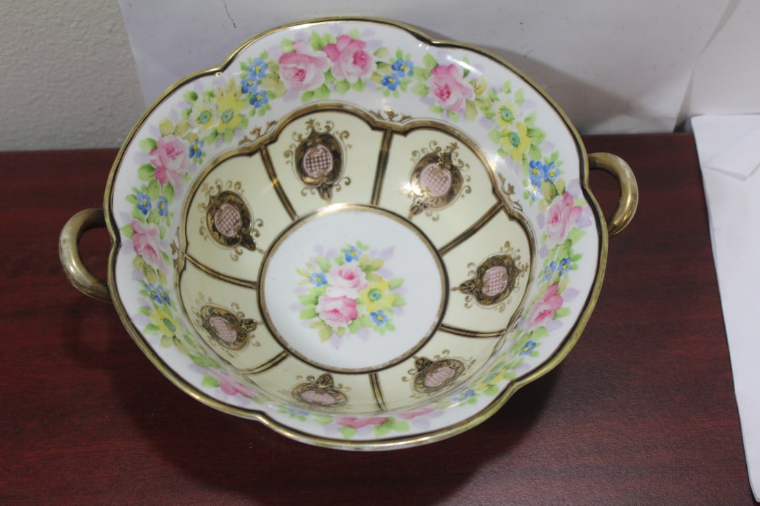 A 2-Handle Nippon Bowl: 8 3/8" in diameter not including the handle