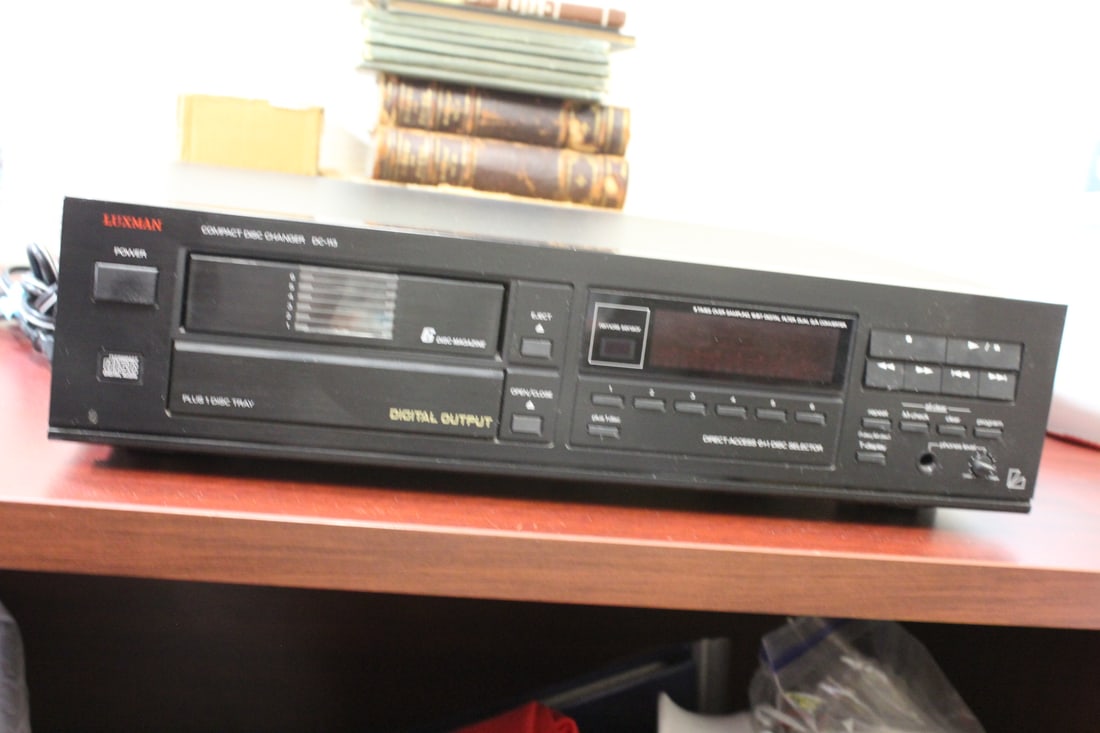 A Luxman 6 Disc Player: not tested to see if it works correctly - with remote and manual