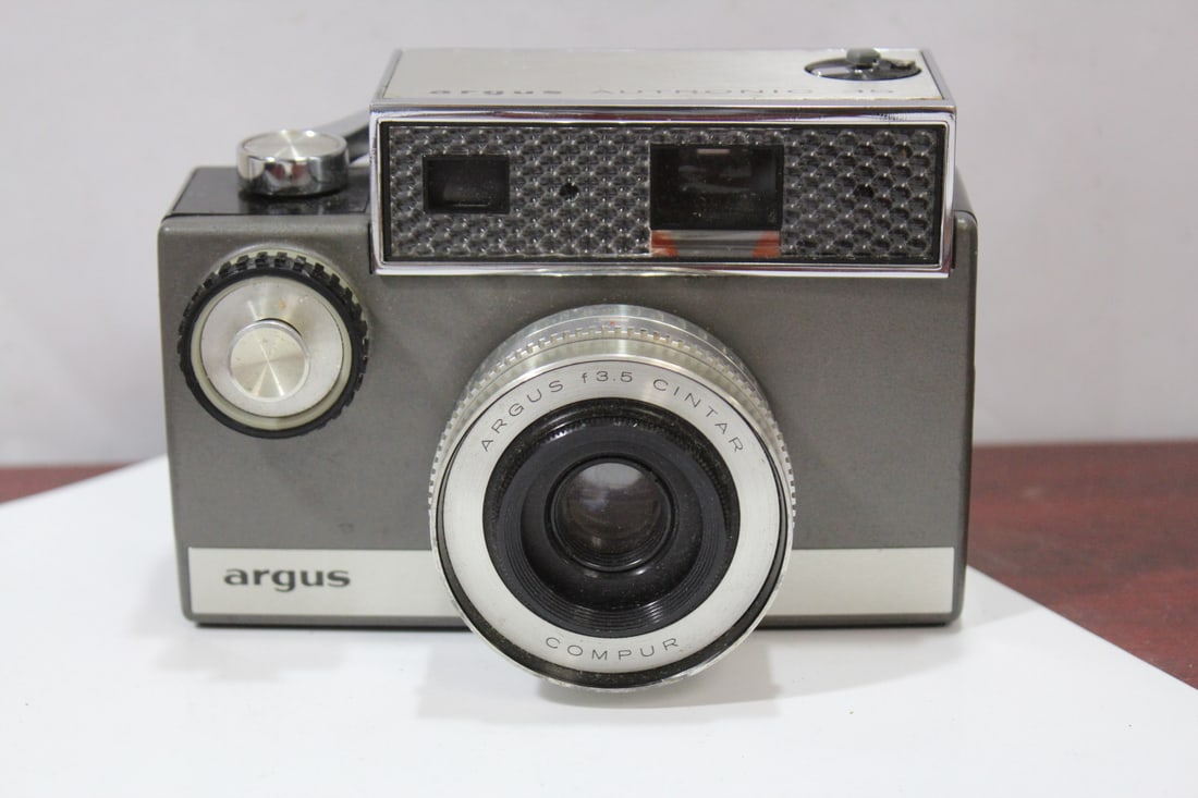 An Argus Camera: do not know if it works or not, because I do not know how to operate it