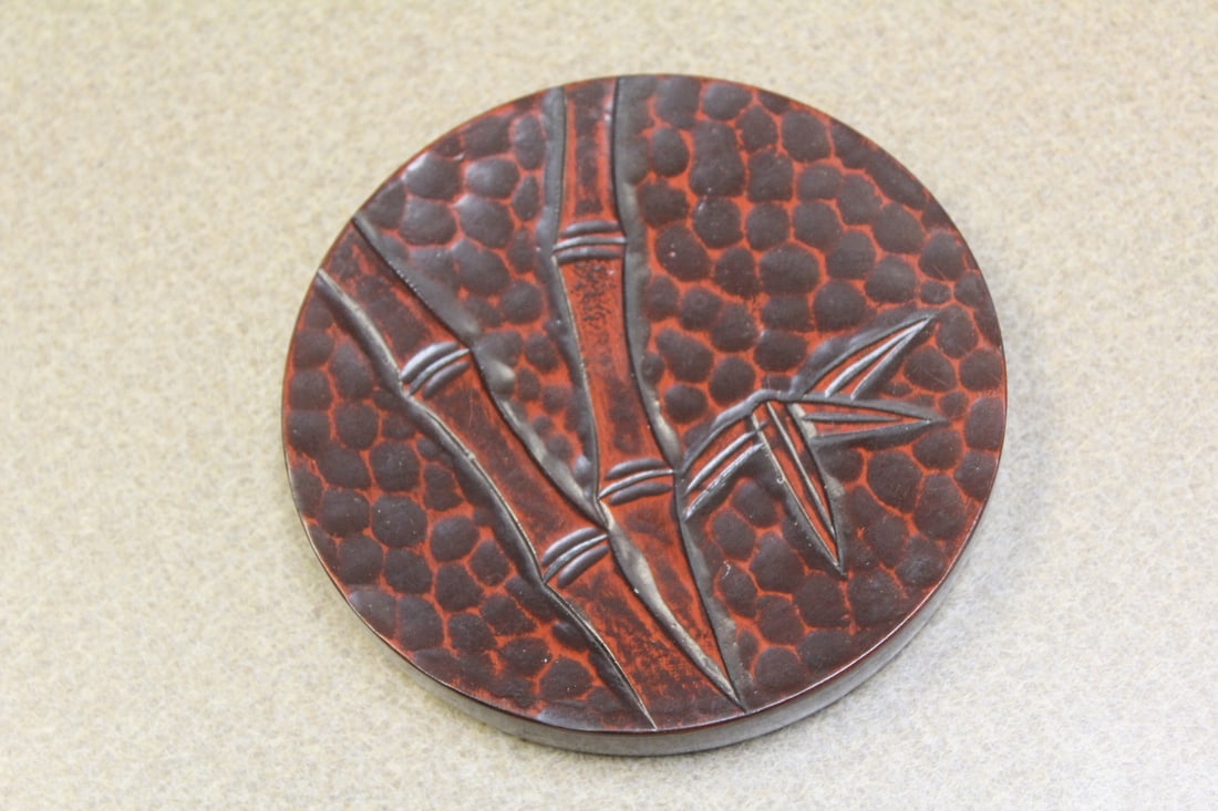 Japanese Cinnabar Style Round Trivet: 5 1/4" in diameter - vintage