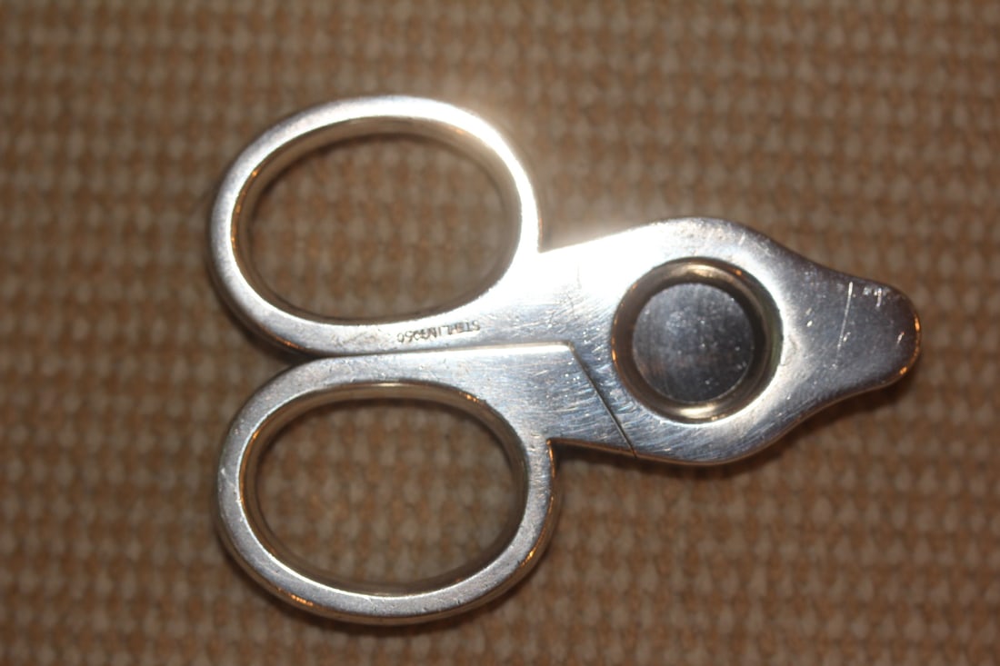 Sterling Cigar Cutter: as shown