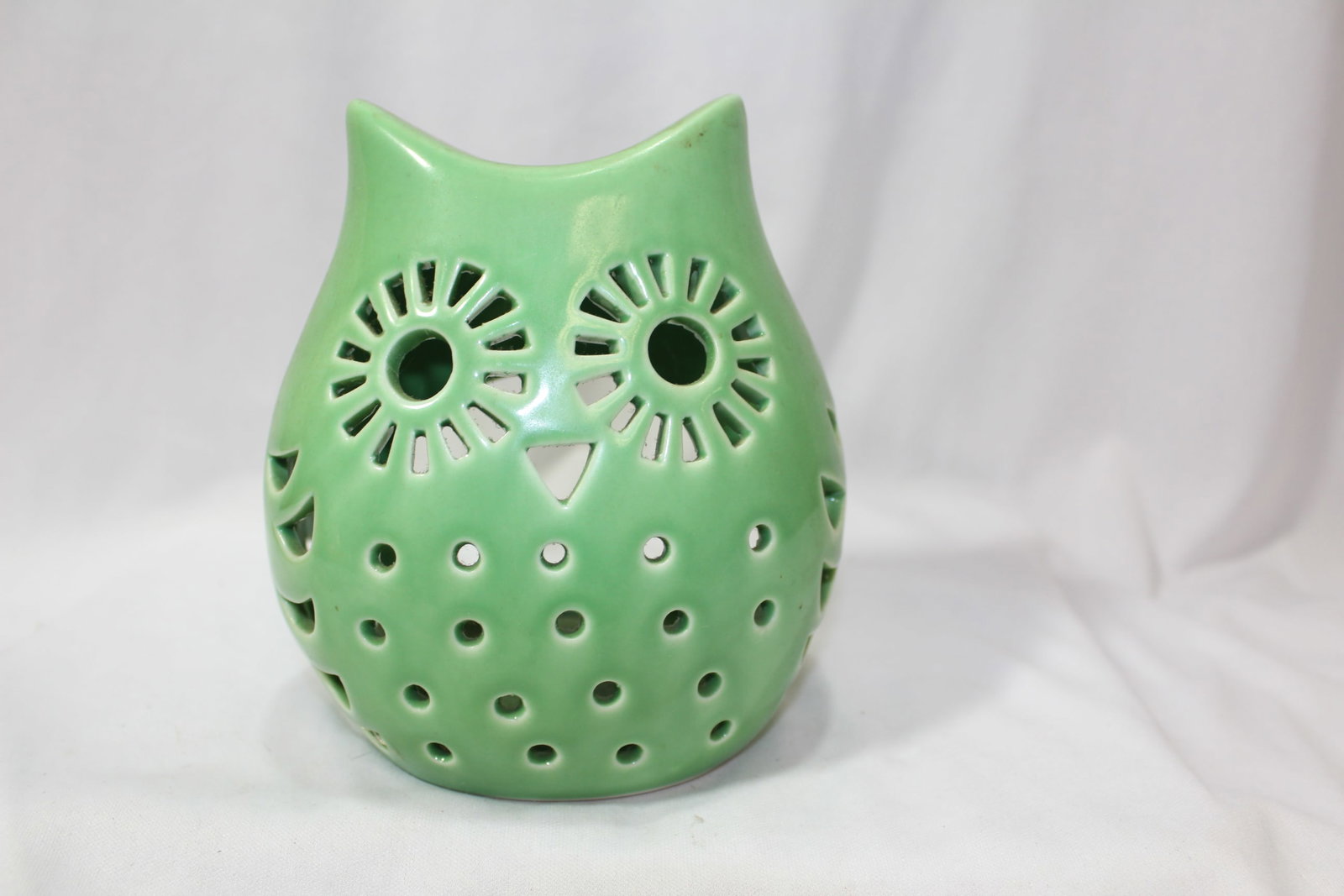 A Ceramic Owl Candle Holder: 5 1/2" tall
