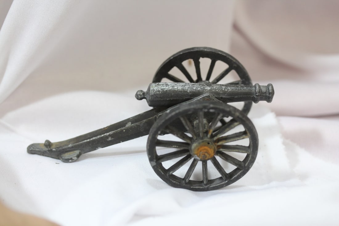 A Pencraft Metal Cannon: made in USA - 4" across