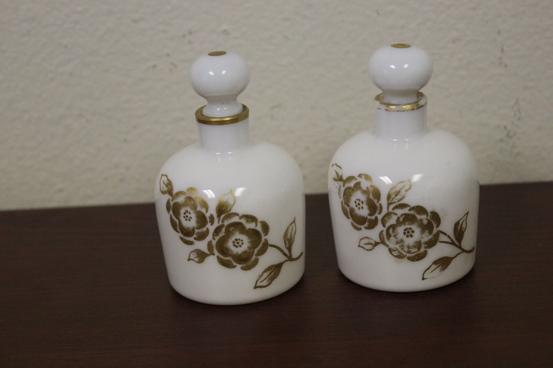 Lot of Two Milk Glass Perfume Bottles: please note: one of the stoppers stuck to the opening - 3 5/8" tall