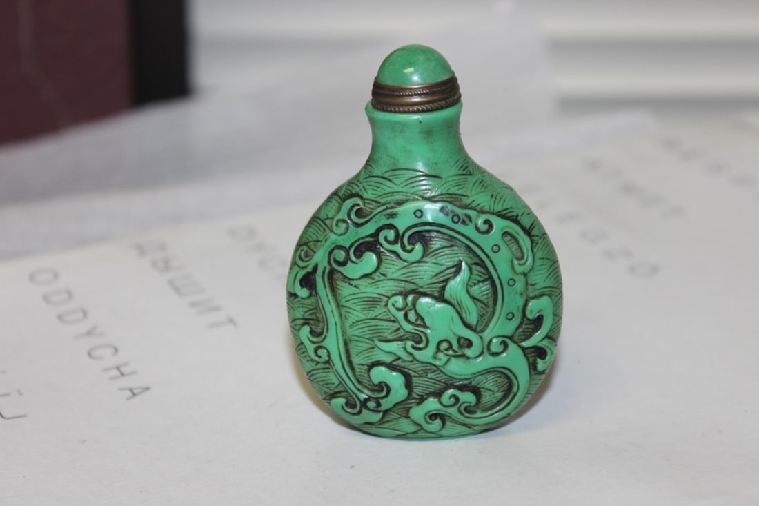 A Well Carved Peking Glass Dragon Snuff Bottle: 3 1/8" tall
