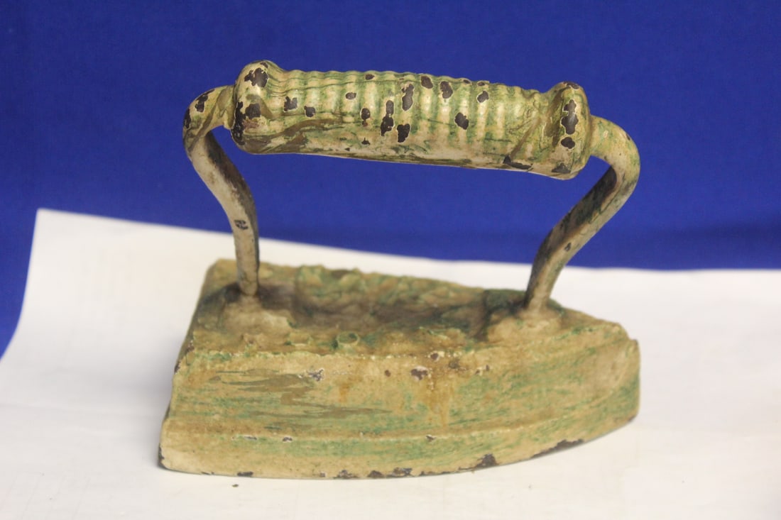 Cast Iron Iron: 5 1/2" across - now a doorstop