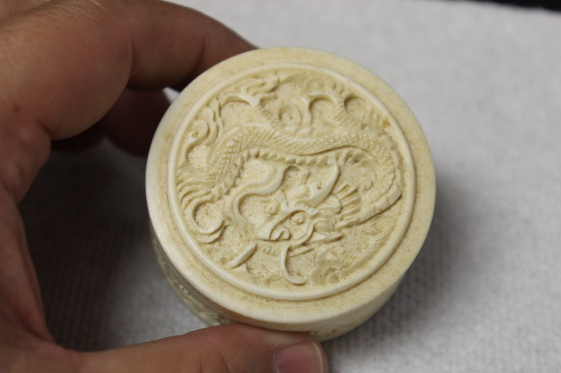 A Chinese Well Carved Bone Trinket or Pill Box: Early 20th Century - 1 7/8" in diameter - 3/4" tall