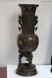 An Antique Japanese Bronze Urn: Meiji period - 19th century - beautifully carved - 14 1/4" tall