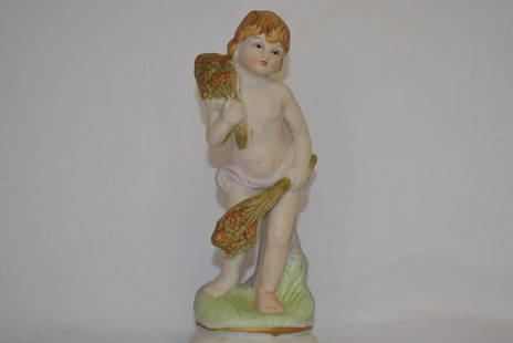 A Bisque Figurine: 6 1/4" tall