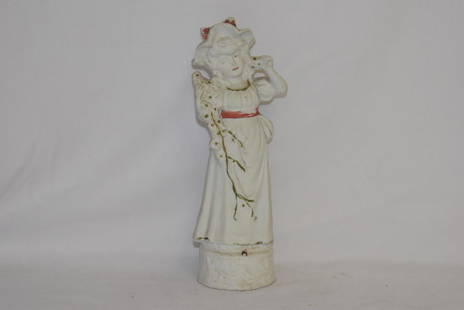 A Bisque Figurine: 7 3/4" tall