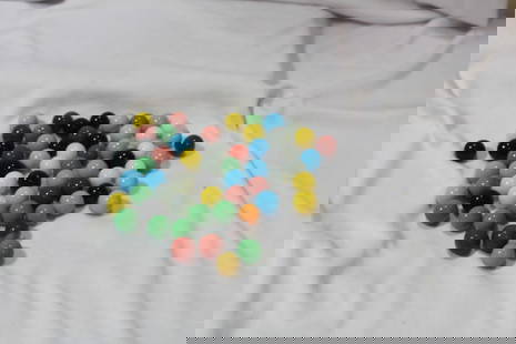A Bag of 65 Marbles: As shown on photos