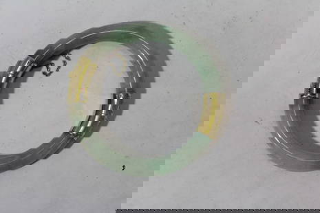 A 14Karat Gold Bangle Bracelet: gold and Apple Green Jade or Jadeite