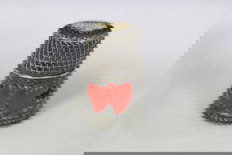 A Stering and Enamel Thimble: as shown