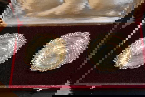 Pair of Silver Saucer: inside a fitted box - marked silver - 3 7/8" in diameter each