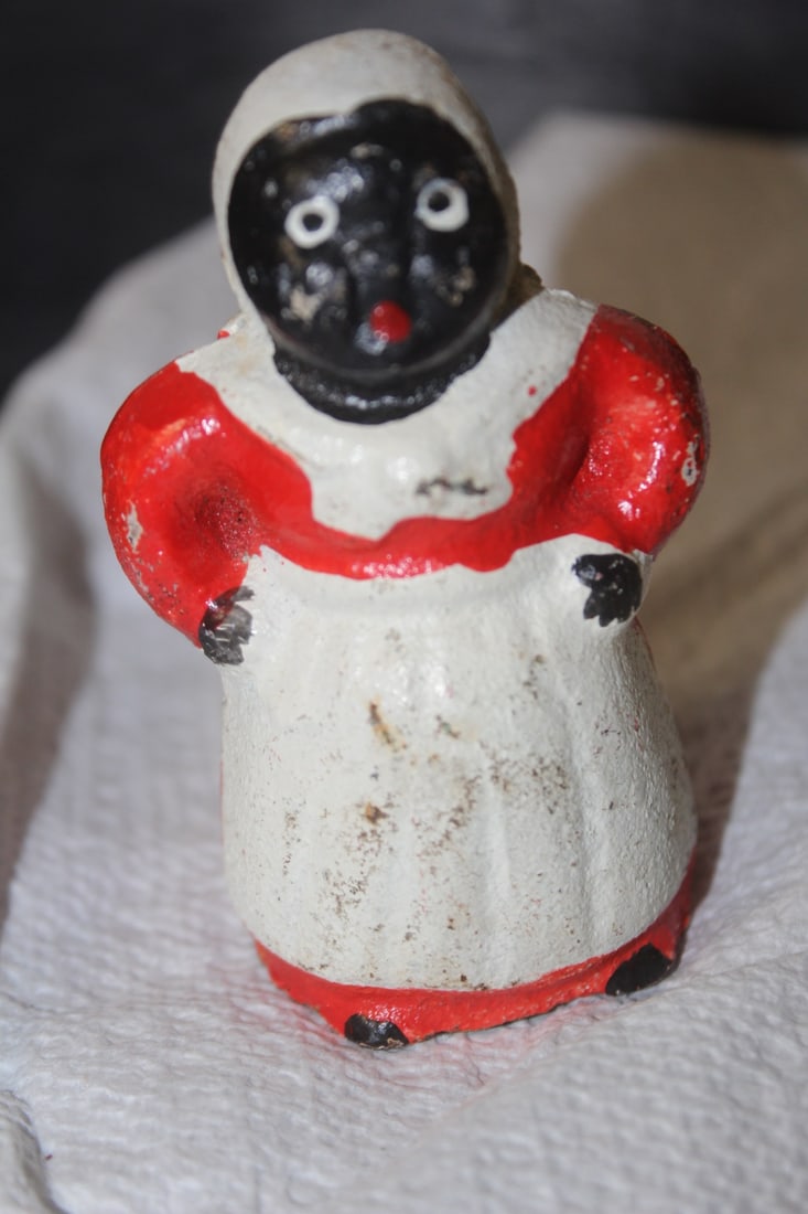 Black Americana Cast Iron Bank: small size= 3 inches tall
