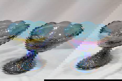 A Pair of Carnival Glass Candle Holders: 4 inches tall