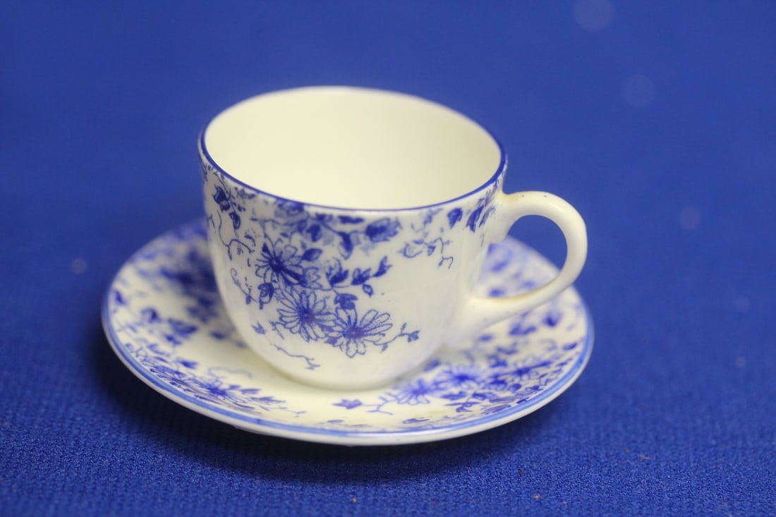 A Miniature Shelley Cup and Saucer: cup= 1 1/4" tall