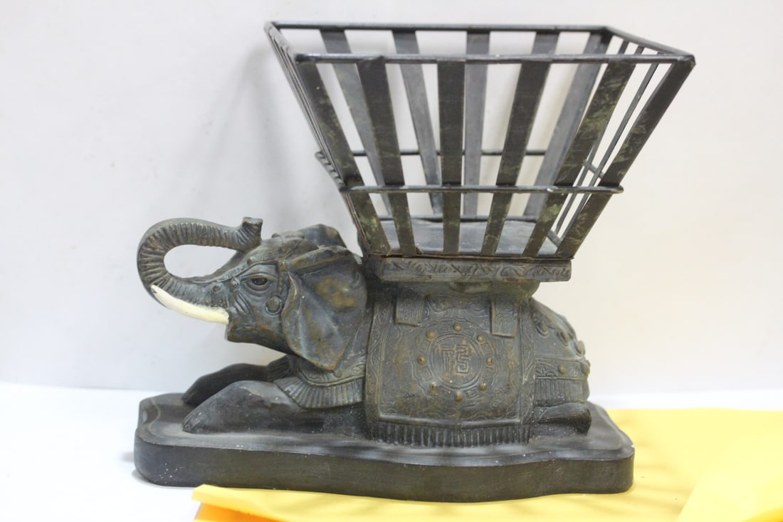 An Elephant Planter: nicely carved - appears to be composite material - 7" tall