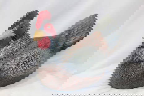 A Ceramic Chicken: 8" across - please note a colorized chip as shown on photos
