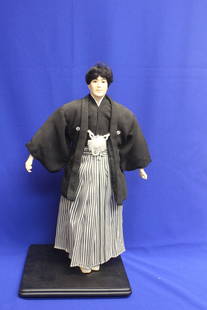 A Danbury Mint Doll: Possibly missing from the hand - by Carl Surgis - 17 1/2" tall