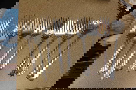 Lot of 9 Silverplate Serving Forks: each approximately 8 1/2" long - some ornate