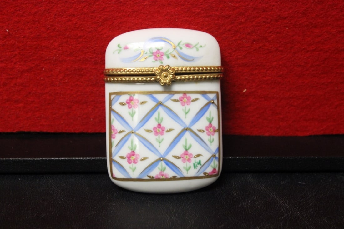 A Limoge Pill Box: 2 7/8" long - porcelain construction