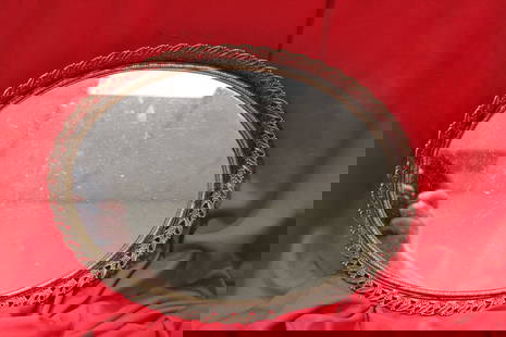A Dresser Mirror: 12" in diameter
