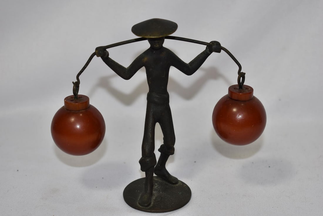 A Deco Bakelite and Cast Iron Walker/Dancer: signed: RR - made in Austria - was told to be very rare - 4 3/4" tall
