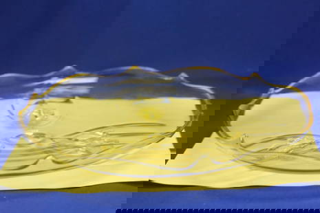 A Yellow Depression Glass Footed Plate: 10 1/2" in diameter