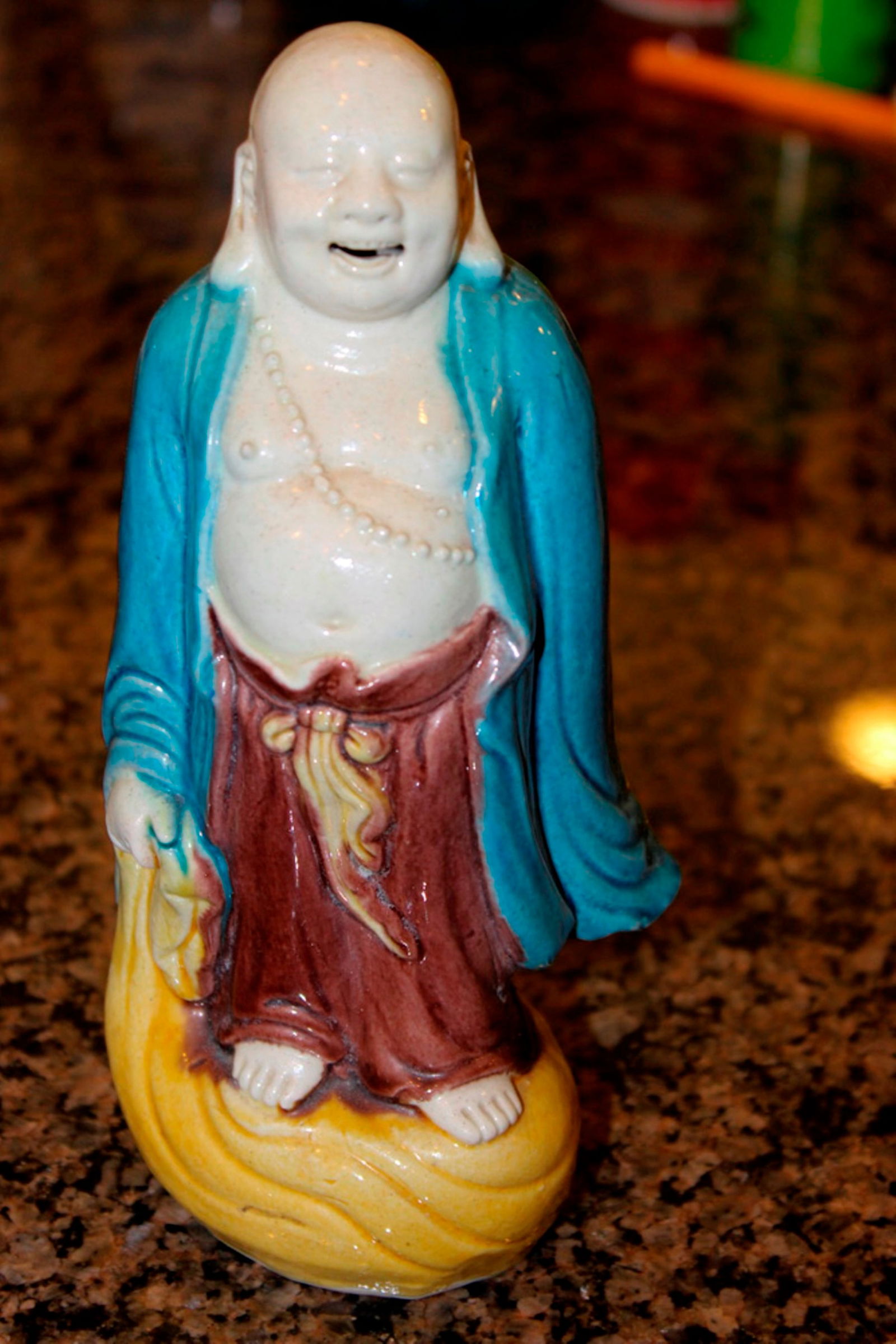Porcelain or Bisque Laughing Buddha: Signed by artist or maker. Chinese 19th / 20th century. Measures 7 3/4" tall.