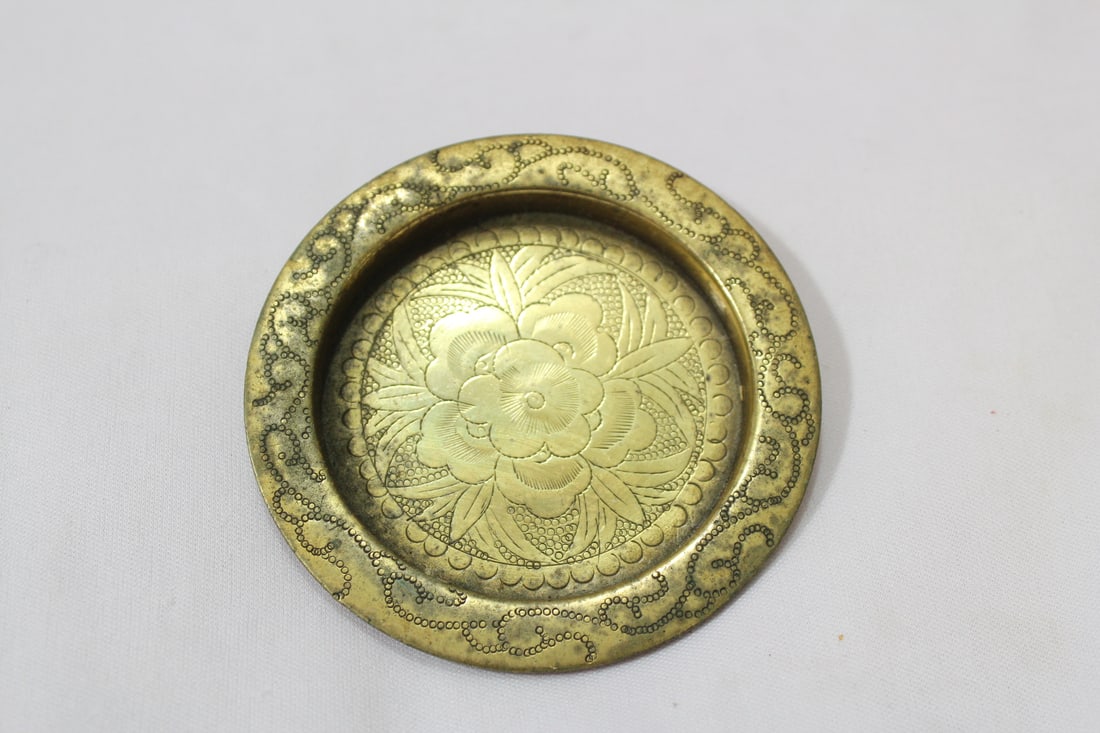 A Chinese Brass Coaster: marked "China" - 3 5/8" in diameter