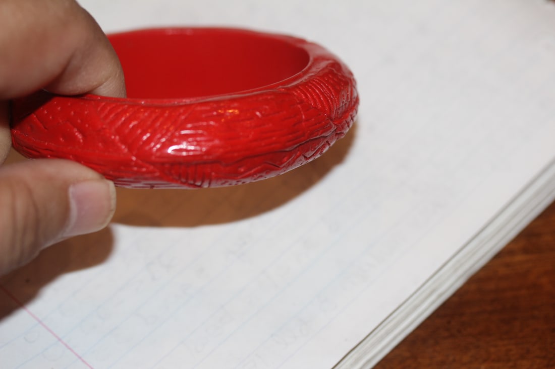 Molded Bangle Bracelet: plastic/lucite/bakelite - inside diameter= 2 3/8"