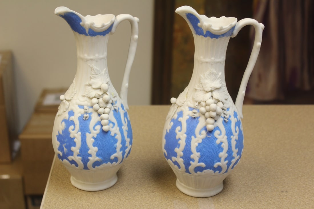 Pair of Bisque Vine Motief Ewers: 9 1/8" tall each