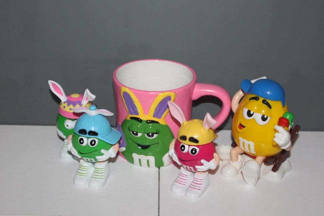 Lot of 5 M&M's Candy Collectibles: Yellow with Ice Cream, Easter Mug and three additional candy dispenser figurines